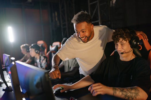 Gamers in a high-energy tournament setting enjoy competitive play with enthusiasm and teamwork.